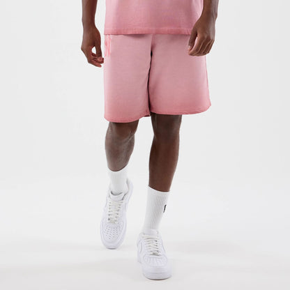 The model is wearing this MLB Washed Logo New York Yankees Shorts in pastel pink. 1