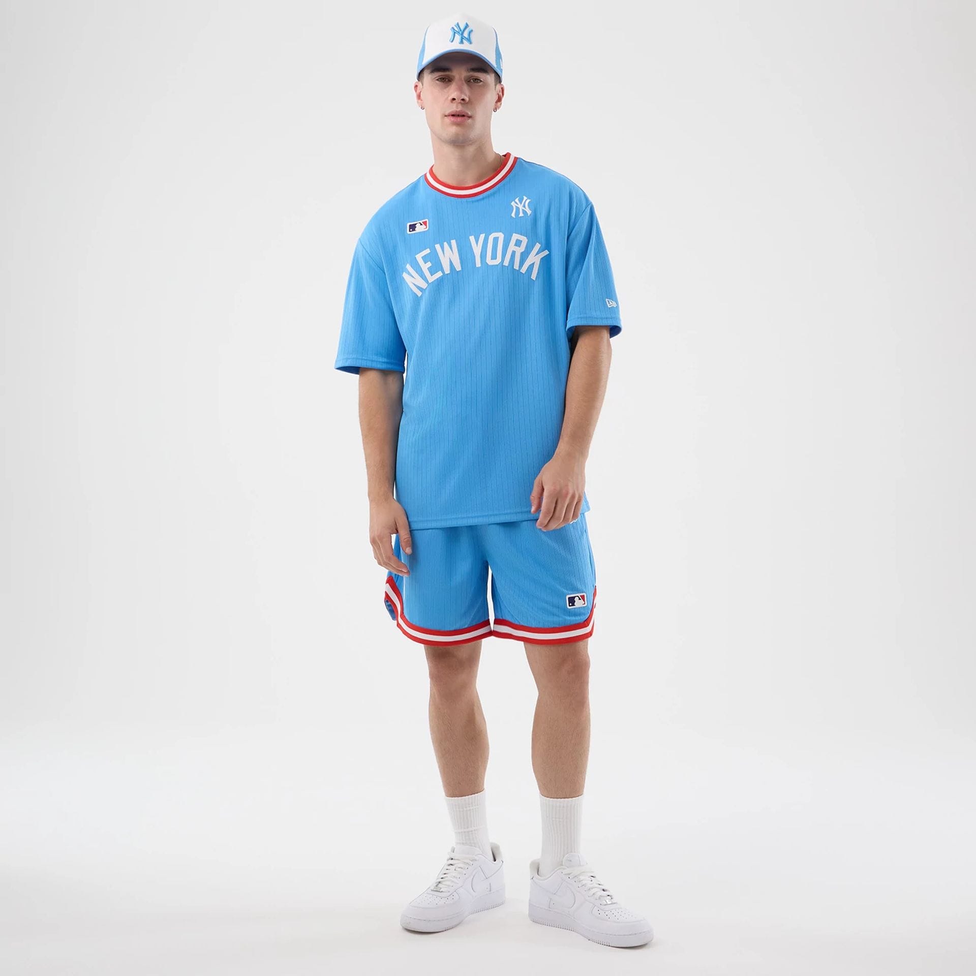The model is wearing this MLB Arch New York Yankees Oversized T-Shirt in pastel blue. 8