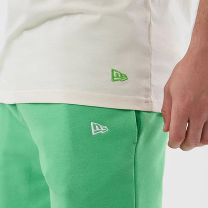 The model is wearing this MLB League Essential LA Dodgers Shorts in open green. 5