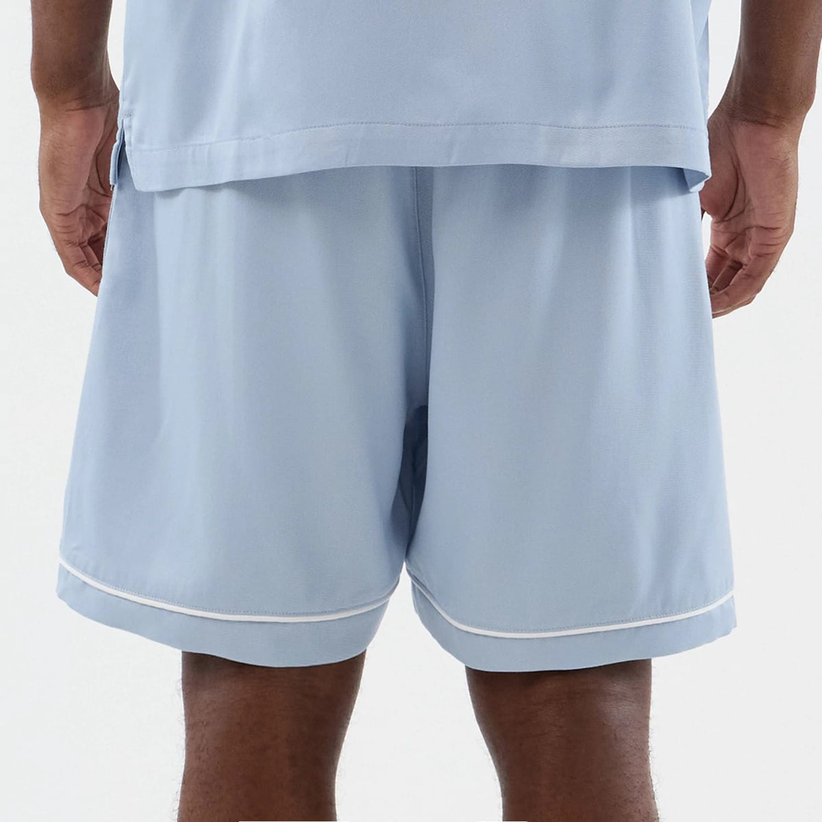 The model is wearing this MLB Woven New York Yankees Shorts in pastel blue. 7