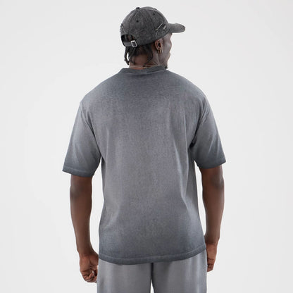 The model is wearing this MLB Washed Logo New York Yankees T-Shirt in black. 2