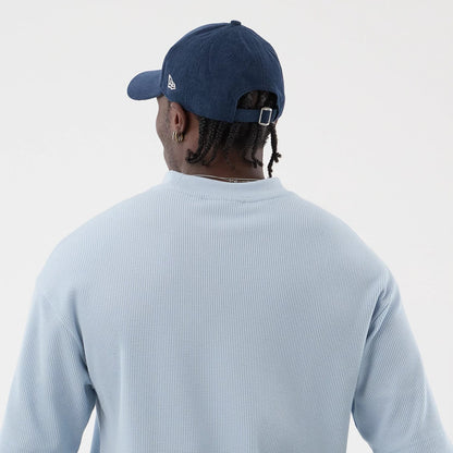The model is wearing this MLB Waffle LA Dodgers T-Shirt in pastel blue. 5