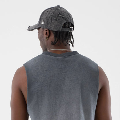 The model is wearing this MLB Washed Logo New York Yankees Vest in black. 7