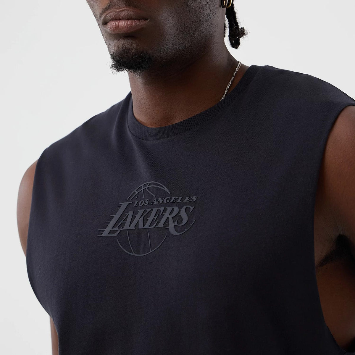 The model is wearing this NBA Core Plus LA Lakers Vest in navy. 6