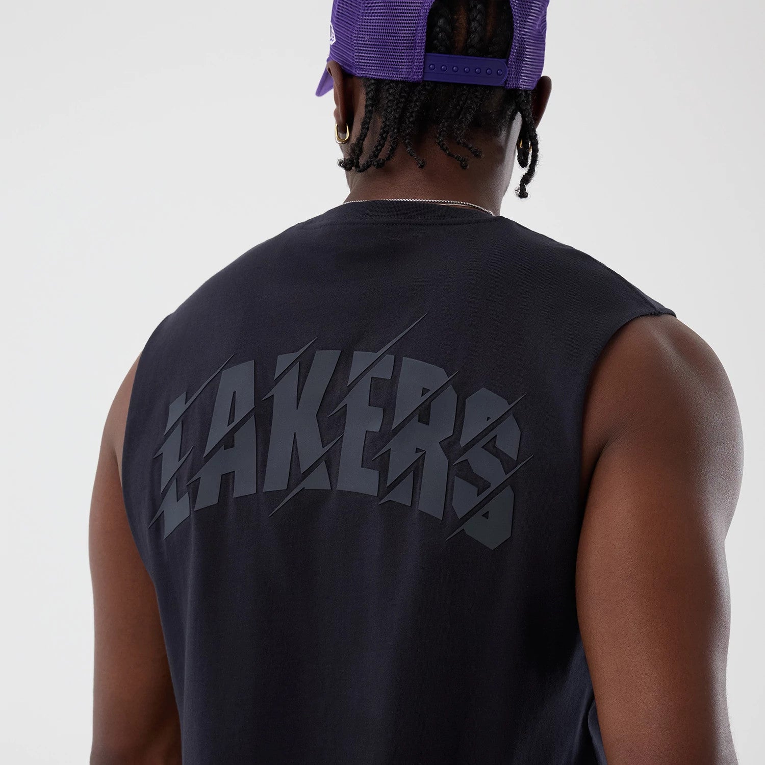 The model is wearing this NBA Core Plus LA Lakers Vest in navy. 4