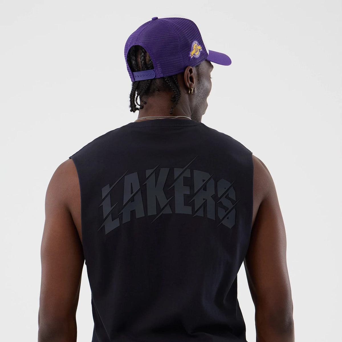 The model is wearing this NBA Core Plus LA Lakers Vest in navy. 7