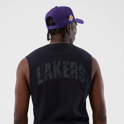 The model is wearing this NBA Core Plus LA Lakers Vest in navy. 7