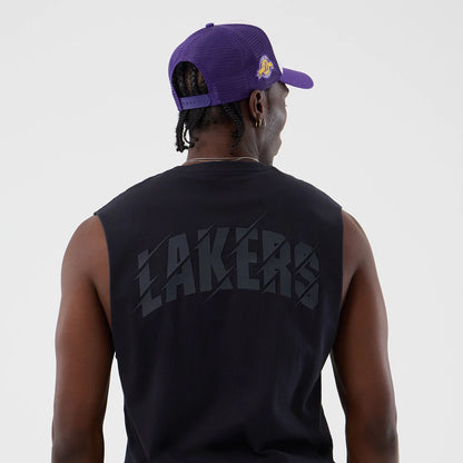 The model is wearing this NBA Core Plus LA Lakers Vest in navy. 7