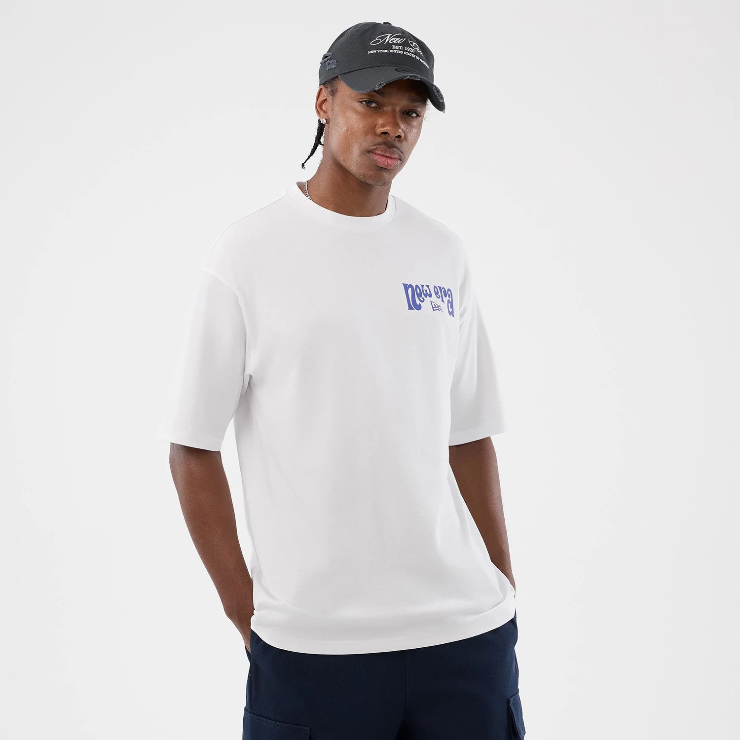 The model is wearing this New Era Fun Pizza Graphic Oversized T-Shirt in white. 3