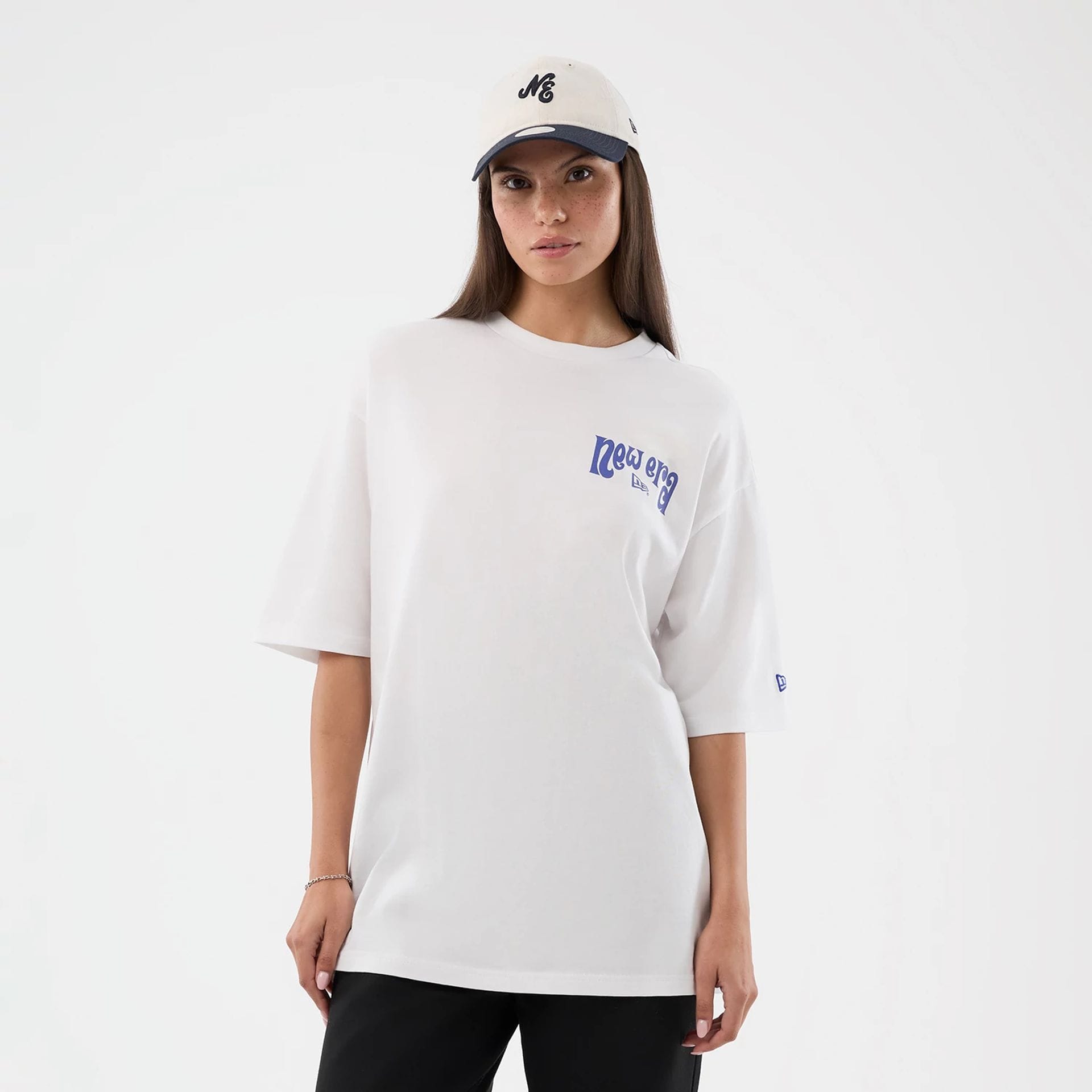 The model is wearing this New Era Fun Pizza Graphic Oversized T-Shirt in white. 5
