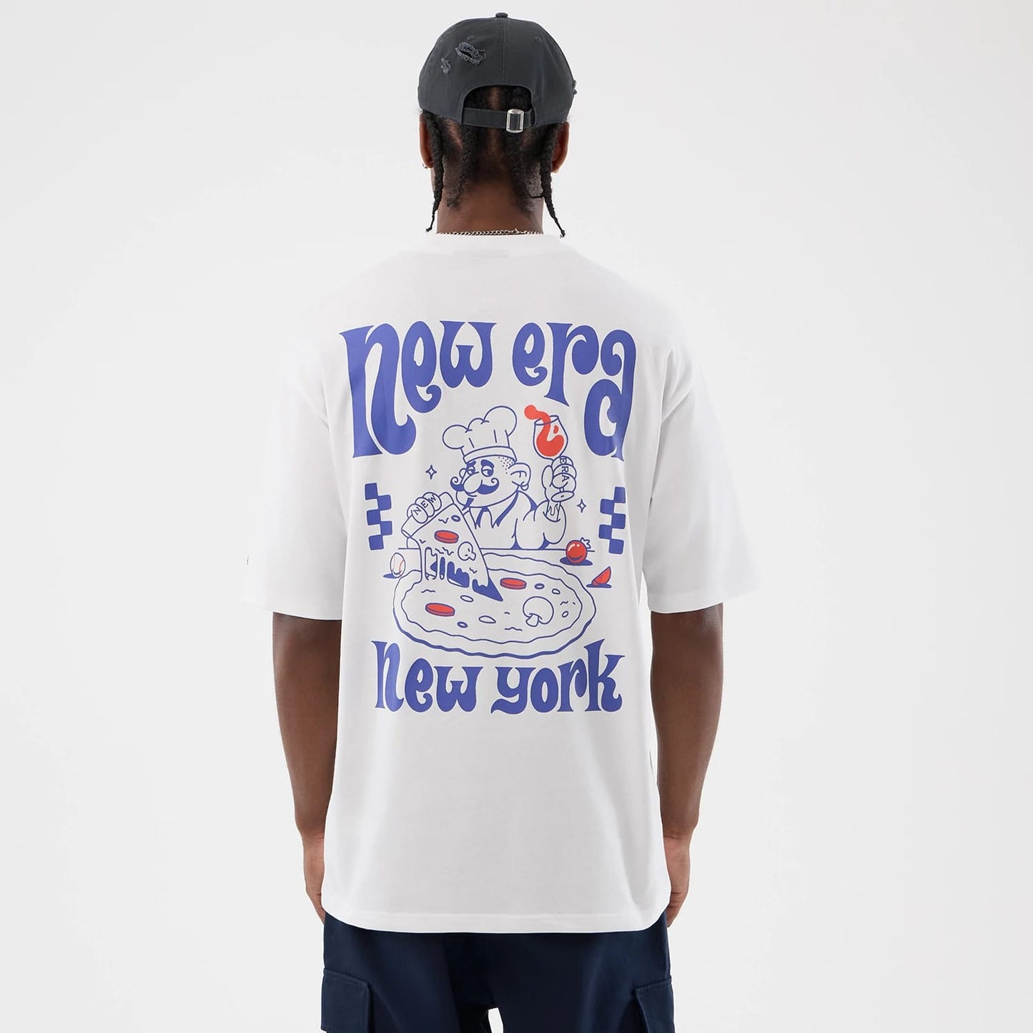 The model is wearing this New Era Fun Pizza Graphic Oversized T-Shirt in white. 2