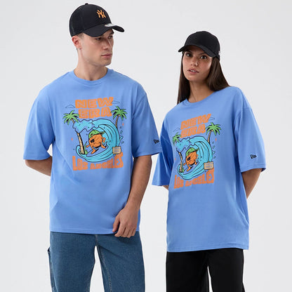 The model is wearing this New Era Basketball Character Graphic T-Shirt in pastel blue. 1