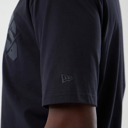 New Era LA Lakers NBA Core Plus Navy Oversized T-Shirt, side view showing the upper arm with a small grey embroidered New Era logo on the sleeve and part of the large LA Lakers graphic on the back in a tone.