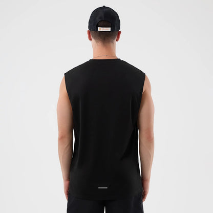 The model is wearing this MLB Core Plus New York Yankees Vest in black. 2