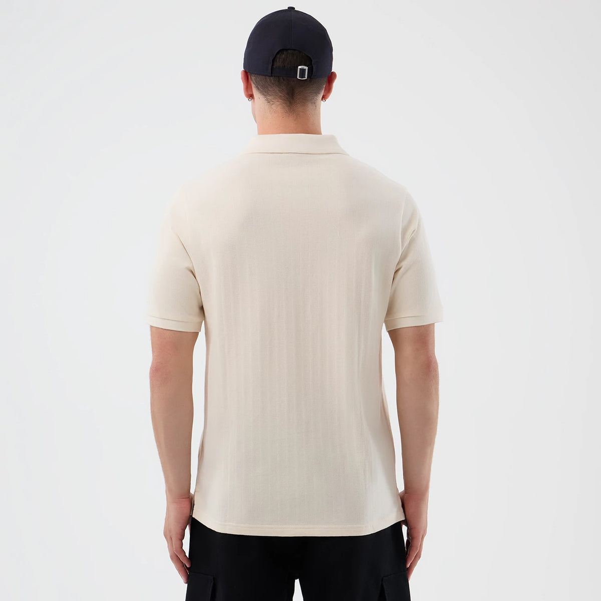 The model is wearing this MLB Rib LA Dodgers Polo T-Shirt in open white. 2