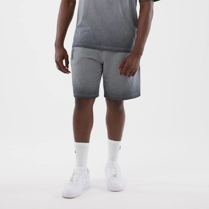 The model is wearing this MLB Washed Logo New York Yankees Shorts in black. 1