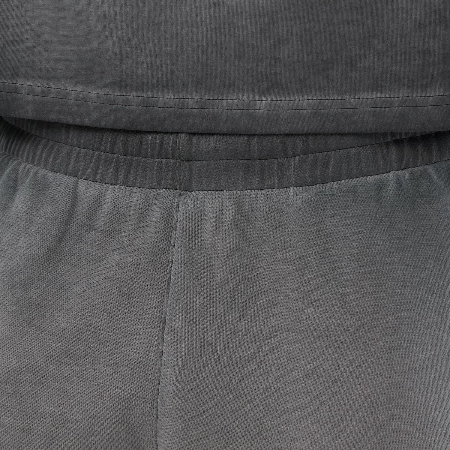 The model is wearing this MLB Washed Logo New York Yankees Shorts in black. 5