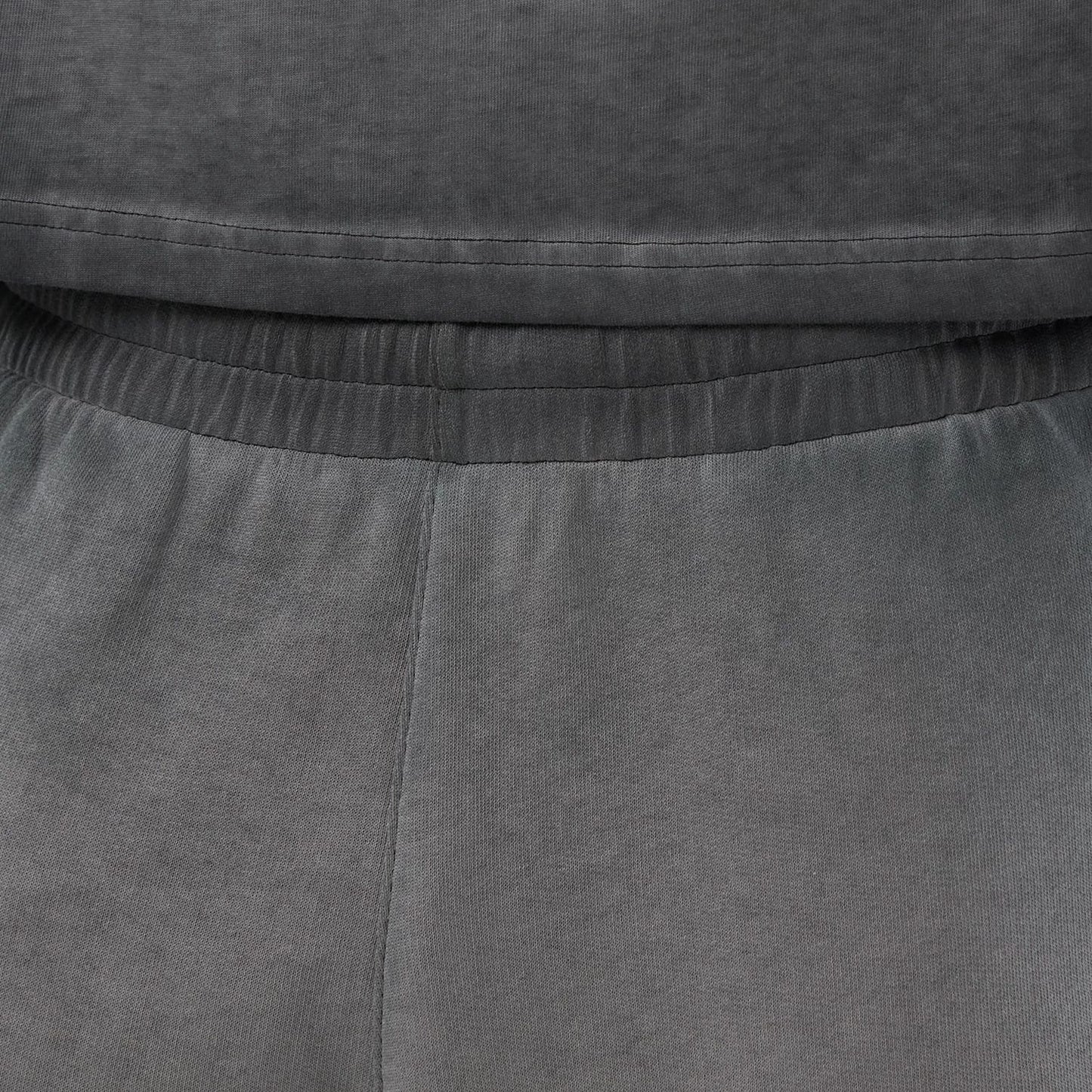 The model is wearing this MLB Washed Logo New York Yankees Shorts in black. 5