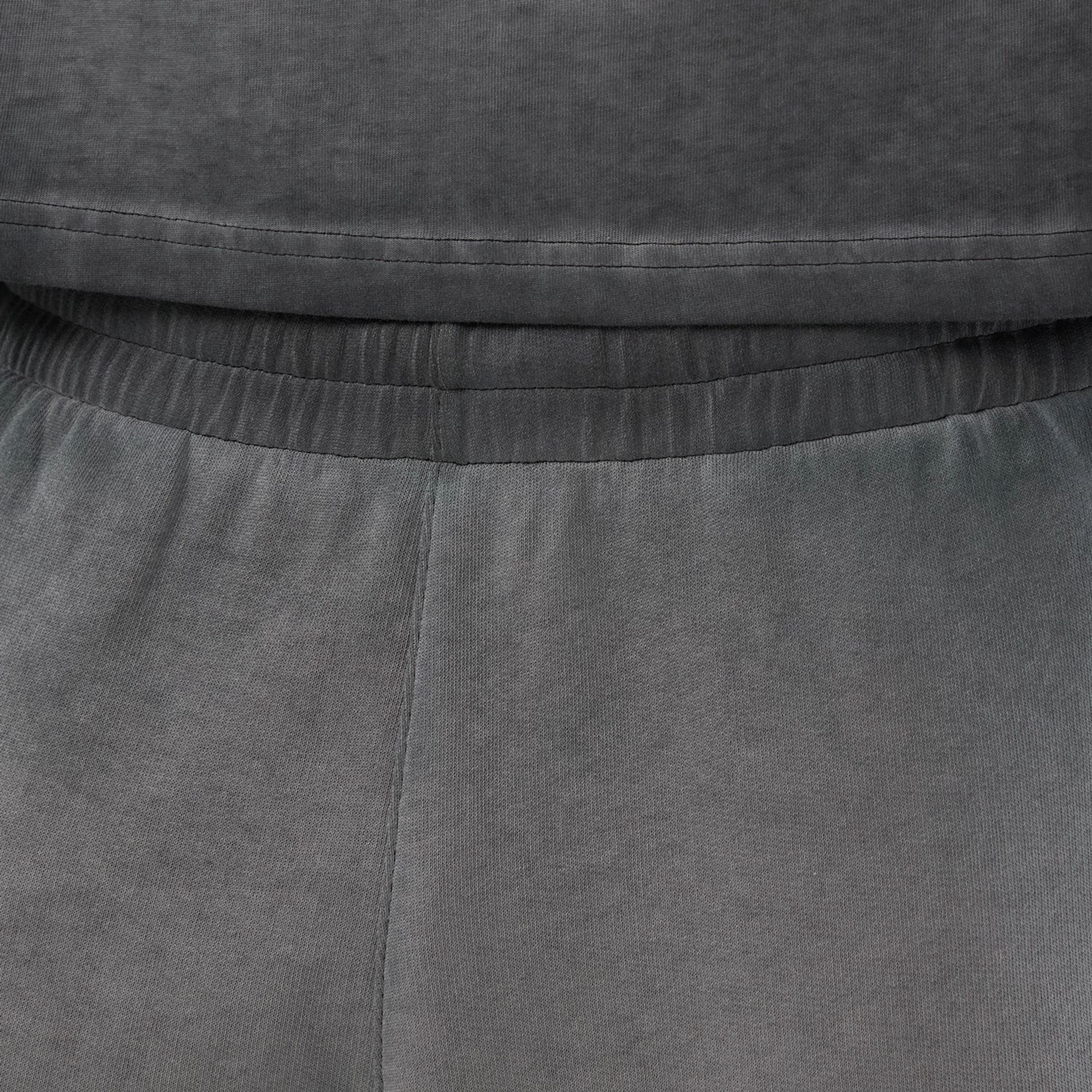 The model is wearing this MLB Washed Logo New York Yankees Shorts in black. 5