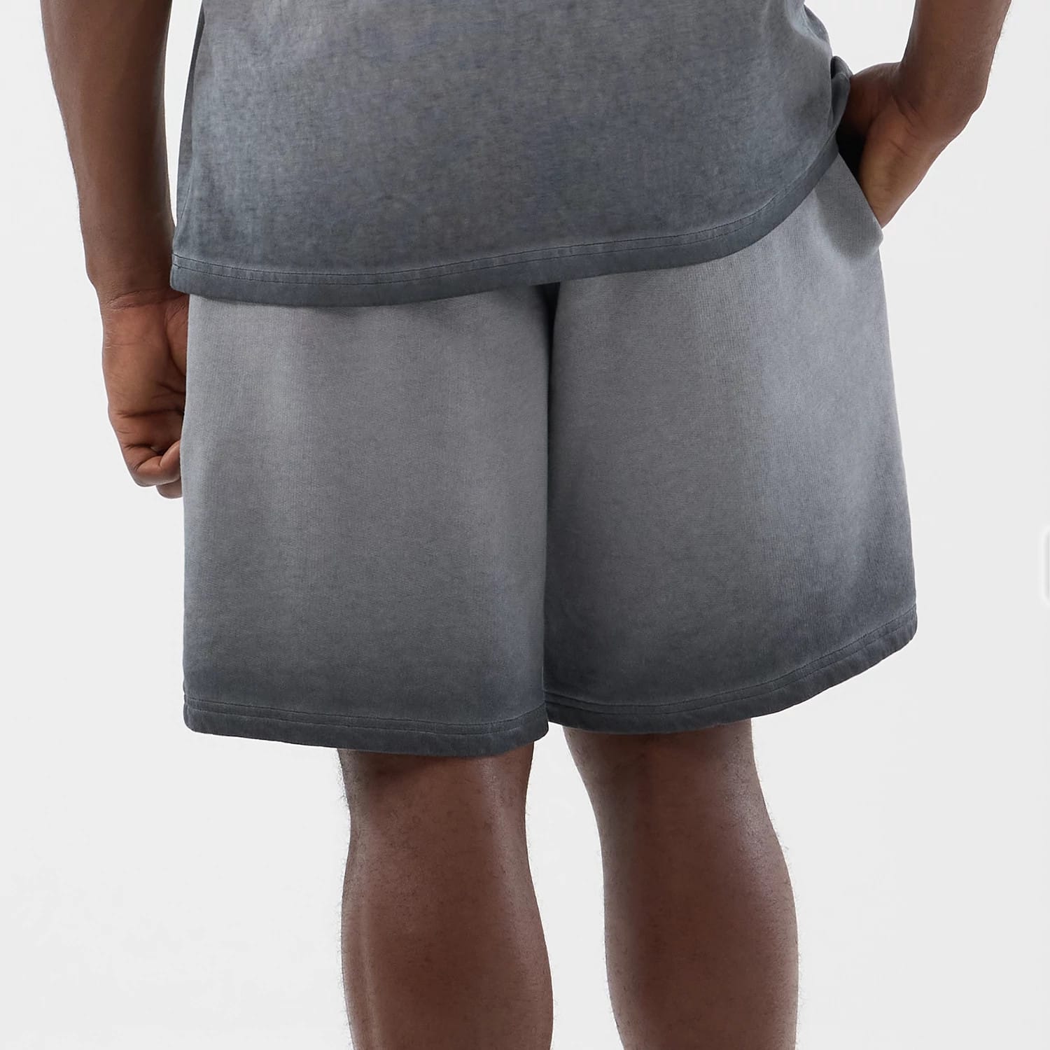 The model is wearing this MLB Washed Logo New York Yankees Shorts in black. 6