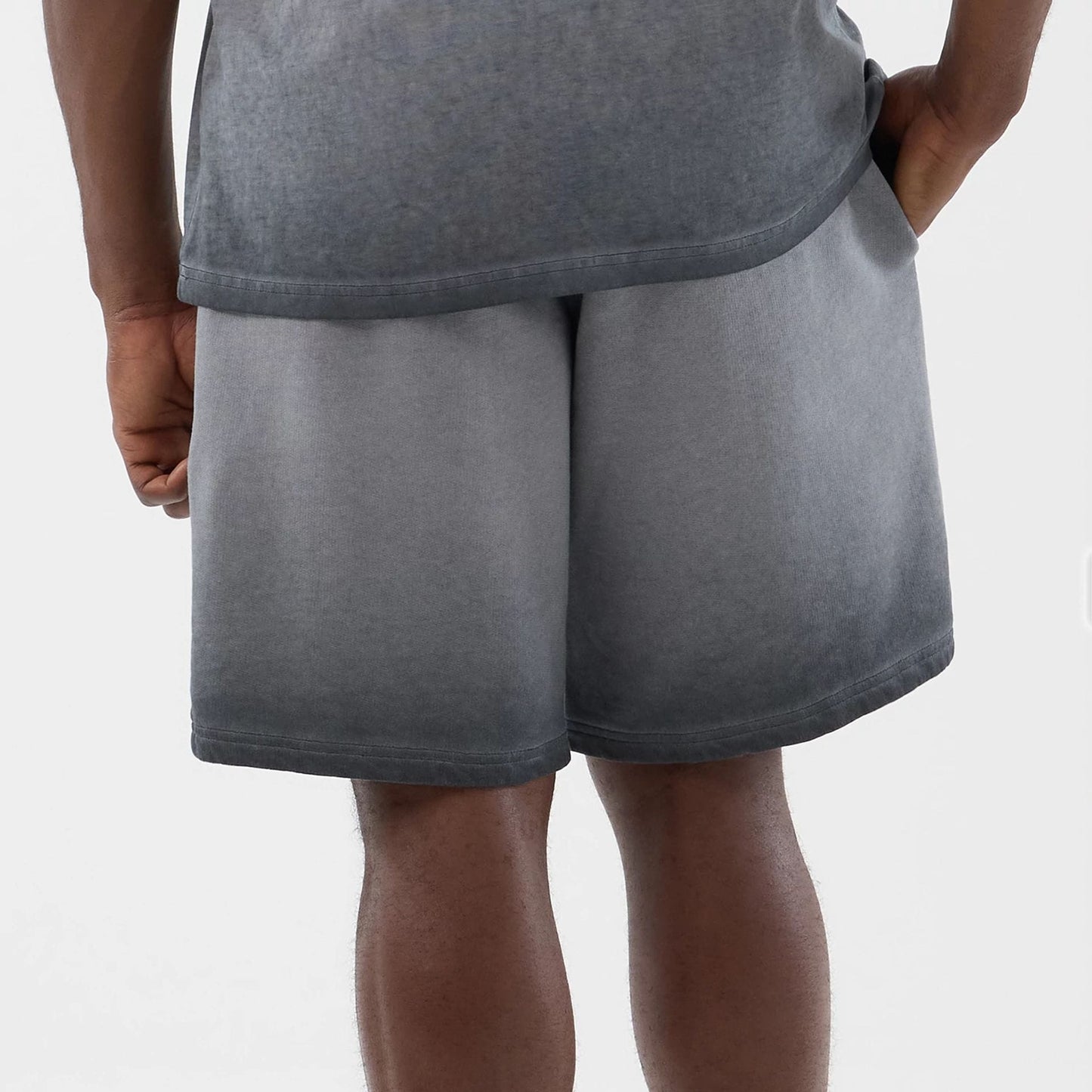 The model is wearing this MLB Washed Logo New York Yankees Shorts in black. 6