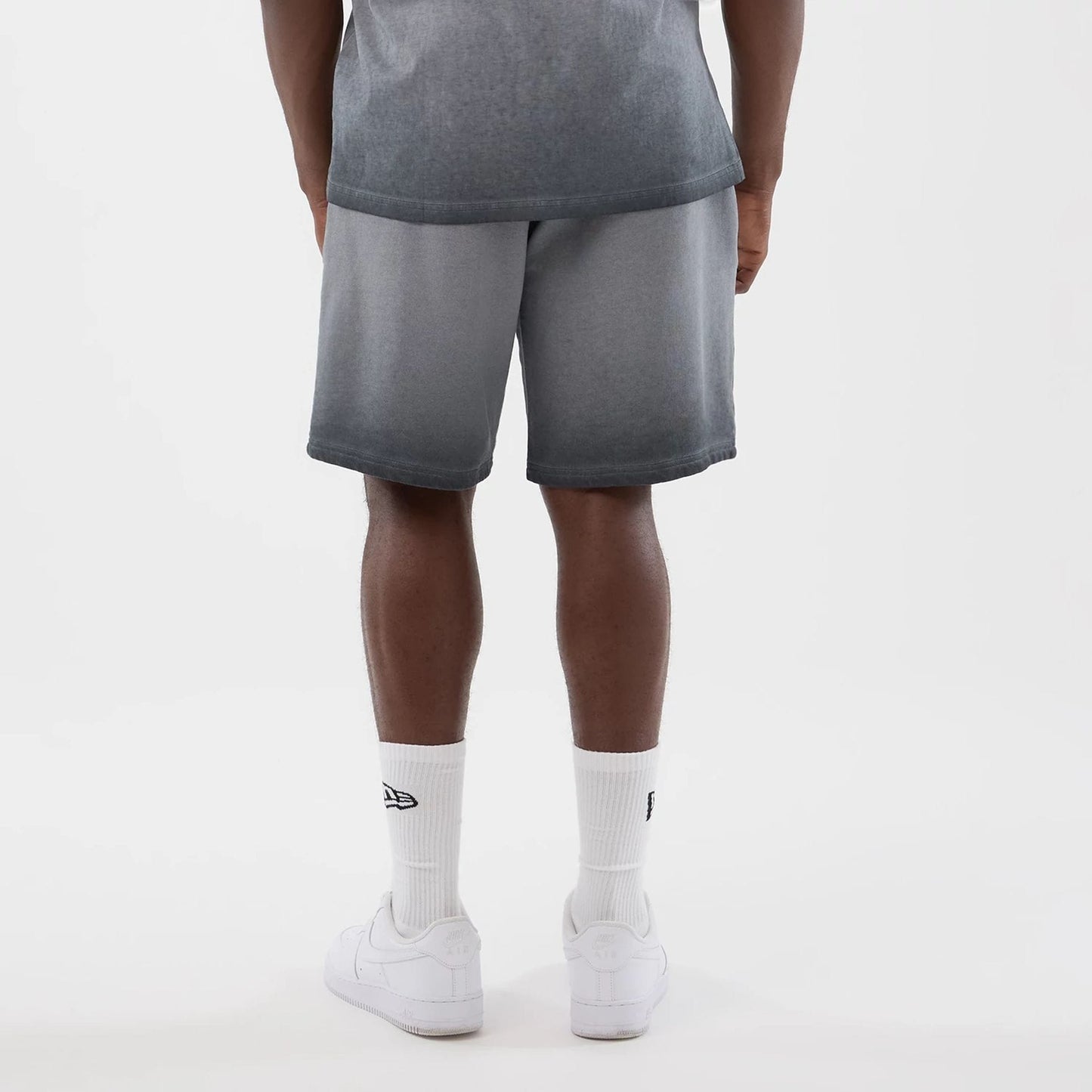 The model is wearing this MLB Washed Logo New York Yankees Shorts in black. 2