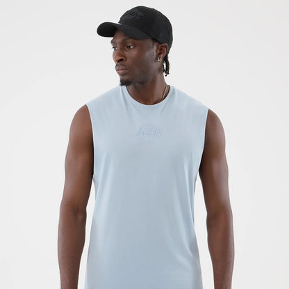 The model is wearing this NBA League Essential LA Lakers Vest in pastel blue. 3