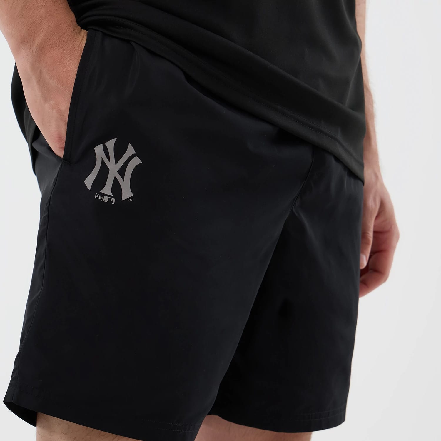 The model is wearing this MLB Core Plus New York Yankees Shorts in black. 3