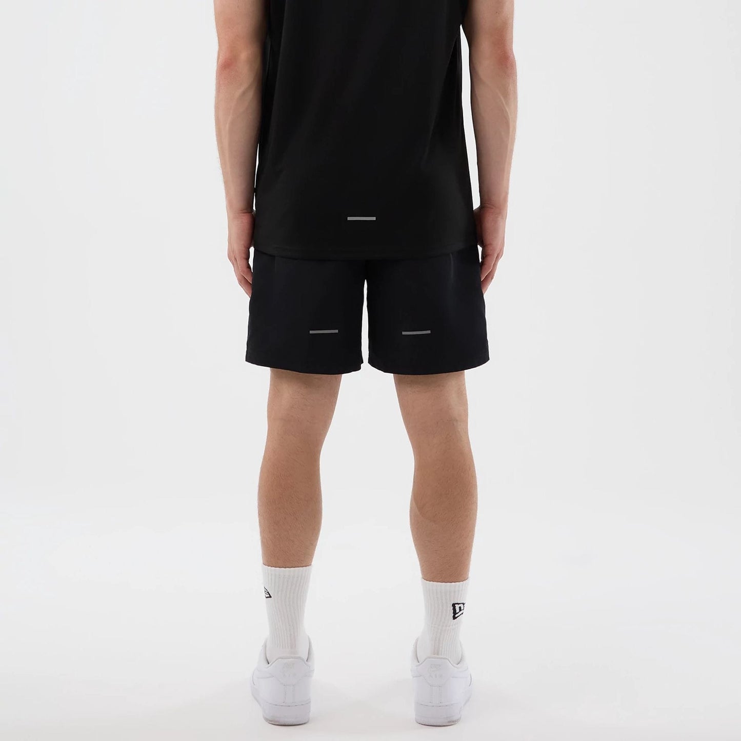 The model is wearing this MLB Core Plus New York Yankees Shorts in black. 2