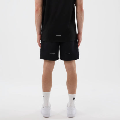 The model is wearing this MLB Core Plus New York Yankees Shorts in black. 2