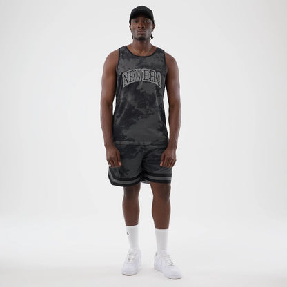 The model is wearing this New Era All Over Print Mesh Shorts in black camo. 7