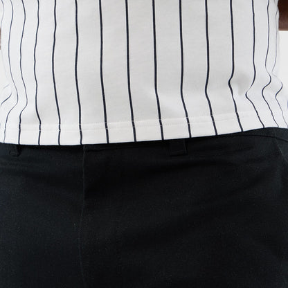 The model is wearing this New Era Cargo Shorts in black. 4