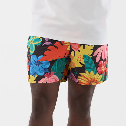 The model is wearing this New Era Floral Swimming Shorts in black. 5