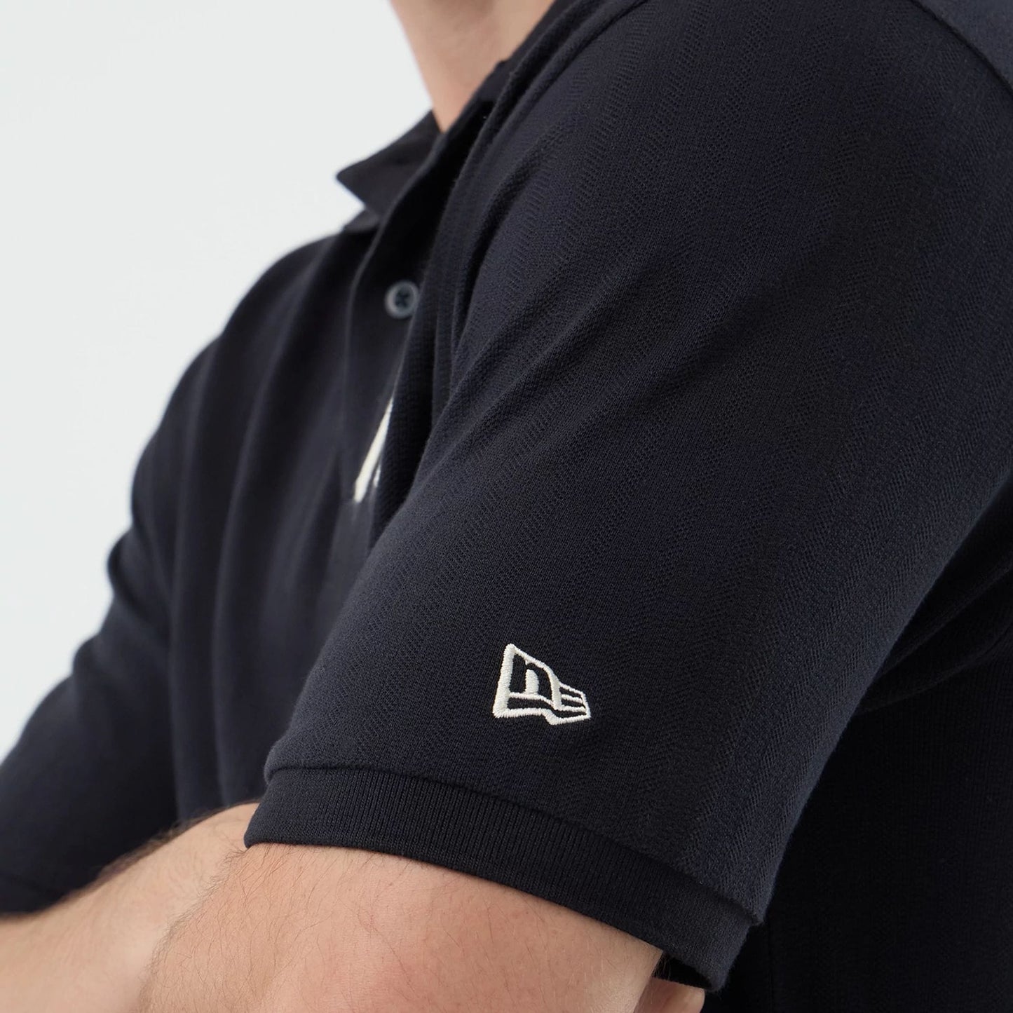 The model is wearing this MLB Rib New York Yankees Polo T-Shirt in navy. 5