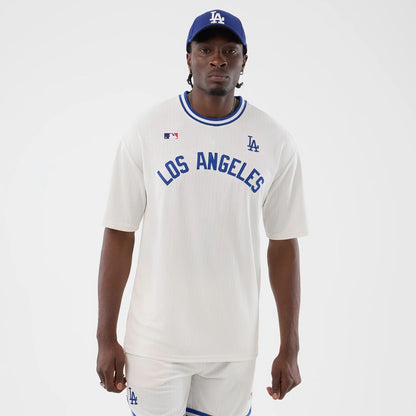 The model is wearing this MLB Arch LA Dodgers Oversized T-Shirt in open white. 3