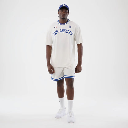 The model is wearing this MLB Arch LA Dodgers Oversized T-Shirt in open white. 8