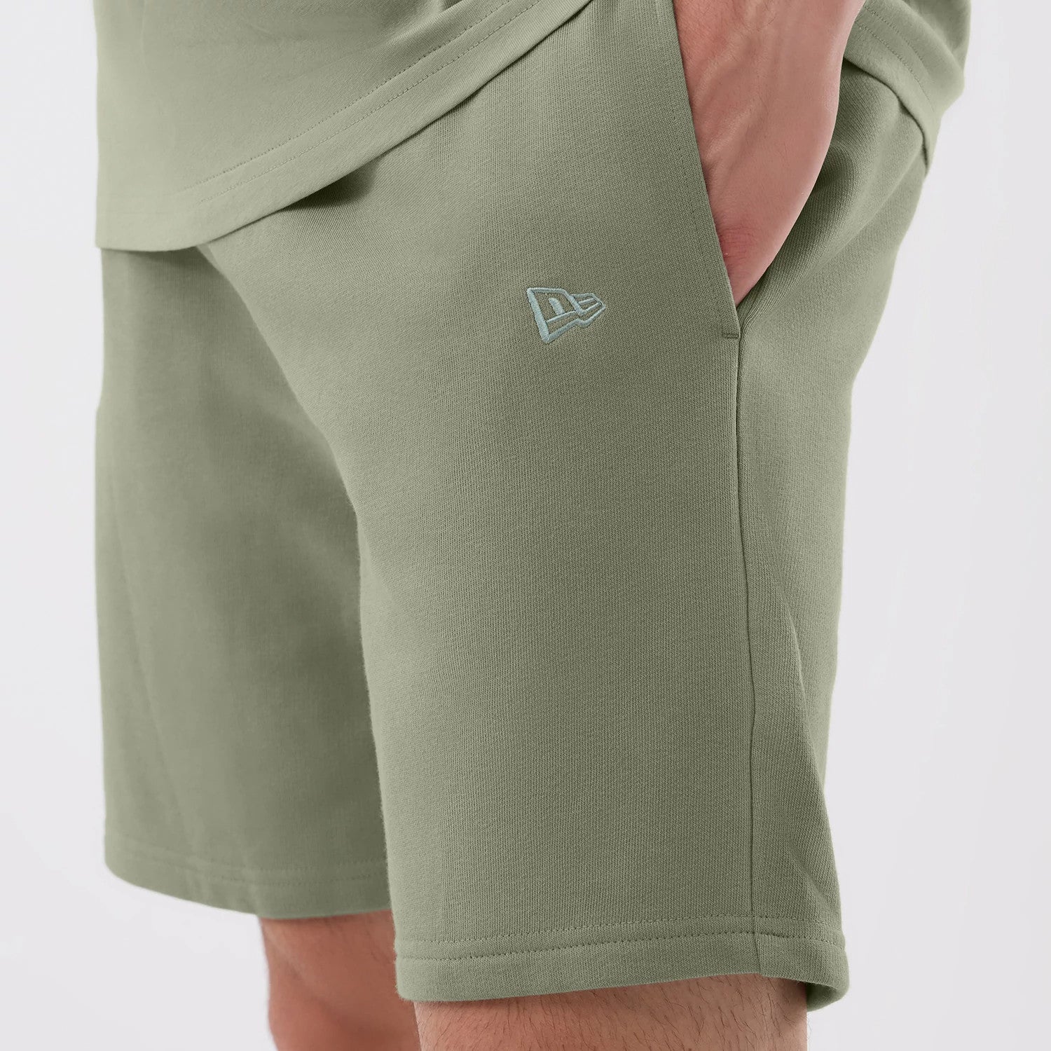 The model is wearing this NBA League Essential Chicago Bulls Shorts in pastel green. 4