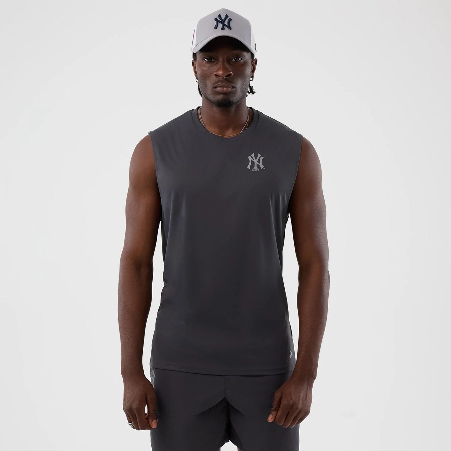 The model is wearing this MLB Core Plus New York Yankees Vest in dark grey. 1