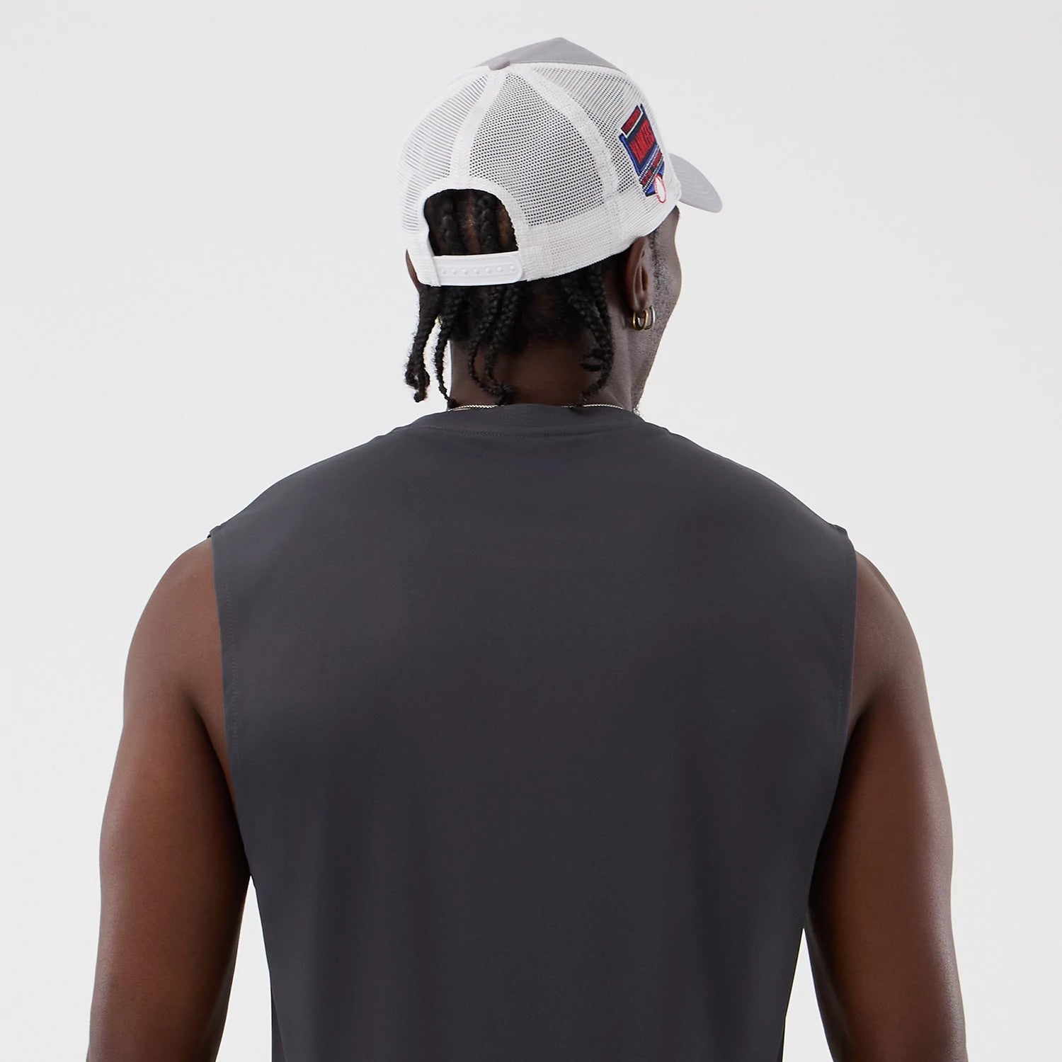 The model is wearing this MLB Core Plus New York Yankees Vest in dark grey. 6