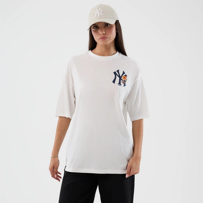 The model is wearing this MLB Floral New York Yankees Oversized T-Shirt in white. 5