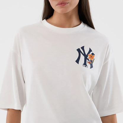 The model is wearing this MLB Floral New York Yankees Oversized T-Shirt in white. 6