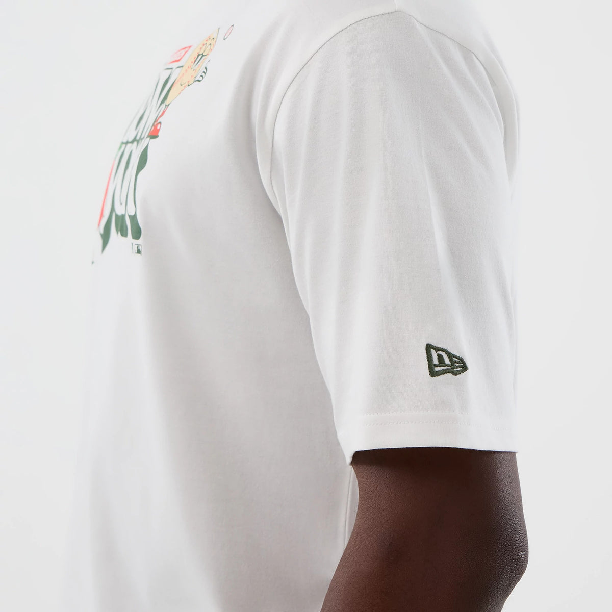 The model is wearing this MLB Icon Graphic New York Yankees T-Shirt in white. 5