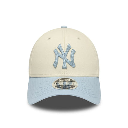 Pictured is this MLB Side Script New York Yankees 9FORTY M-Crown cap in Cream. 2
