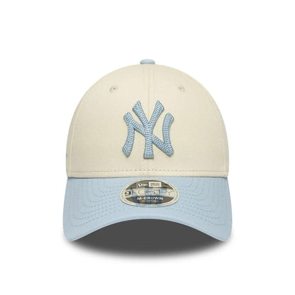 Pictured is this MLB Side Script New York Yankees 9FORTY M-Crown cap in Cream. 2