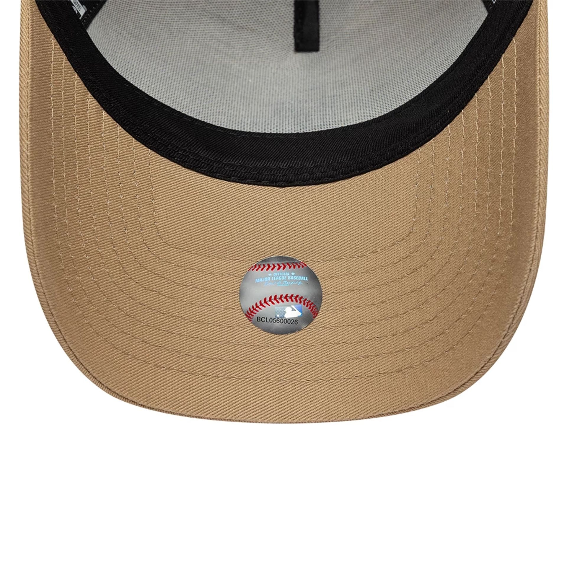 Pictured is this MLB League Essential LA Dodgers 9FORTY E-Frame cap in light beige. 5