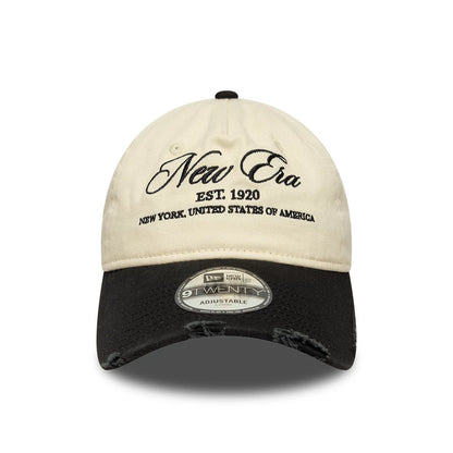 Pictured is this New Era Wash Distress 9TWENTY A-Frame cap in light beige. 2