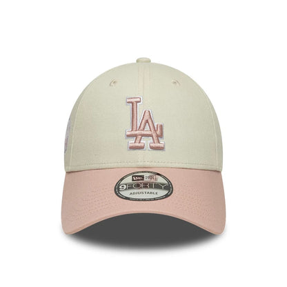 Pictured is this MLB World Series Patch LA Dodgers 9FORTY cap in light beige. 2