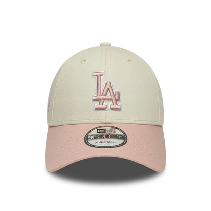 Pictured is this MLB World Series Patch LA Dodgers 9FORTY cap in light beige. 2