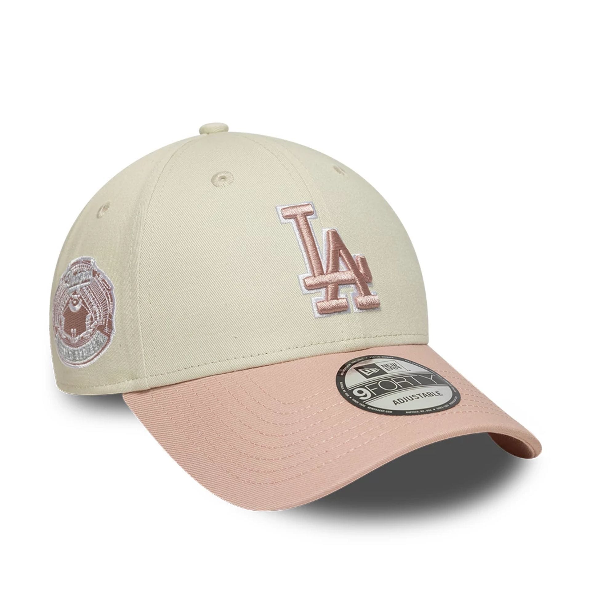 Pictured is this MLB World Series Patch LA Dodgers 9FORTY cap in light beige. 1