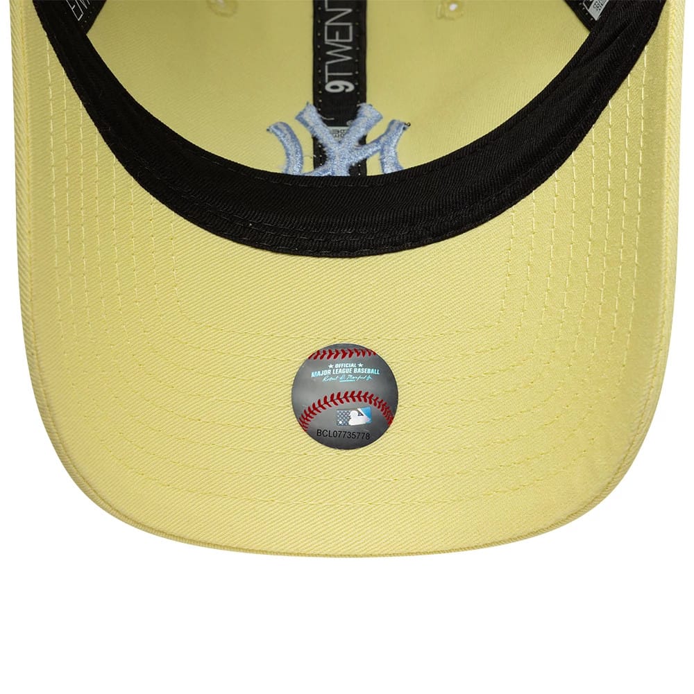 Pictured is this Womens MLB League Essential New York Yankees 9TWENTY cap in pastel yellow. 5
